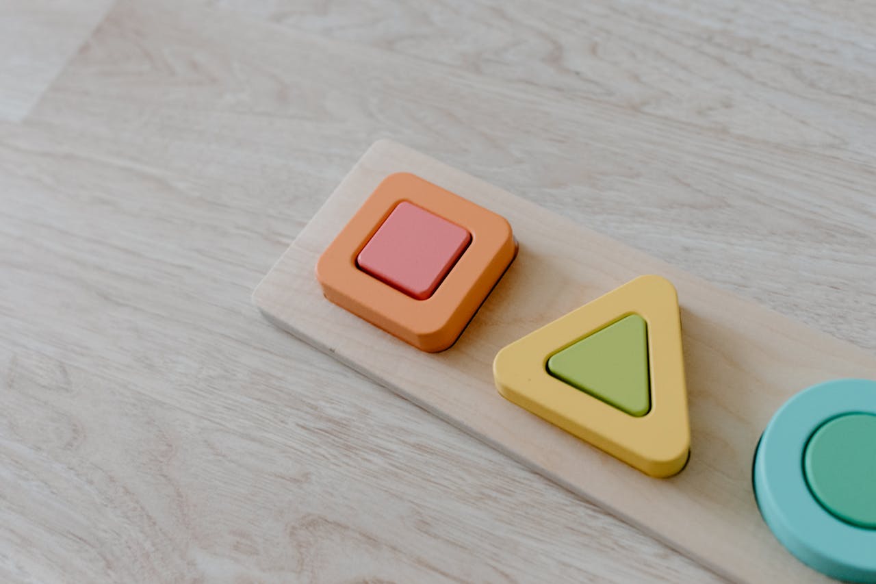 Mastering the First Impression: Your intriguing post title goes here Close-up of a colorful wooden puzzle toy, ideal for sustainable learning.